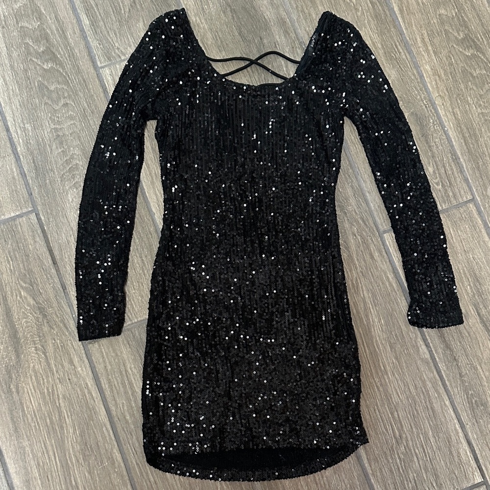 Elegant Black Sequin Size Small Blouse. V back with cross straps. Scoop neck